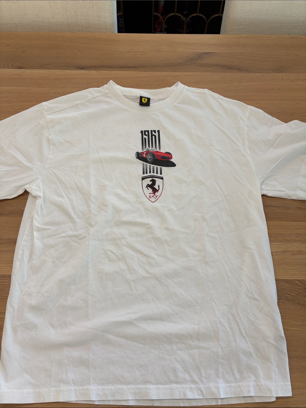 Ferrari White T-Shirt with Red Car and Shield Graphic